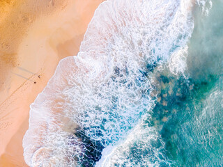 Aerial pastel  of  ocean waves on beach seascape scene - 587971612