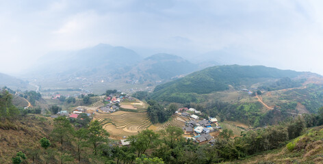 Fototapeta na wymiar Aerial panoramic view of rice terraces and village.Vietnam