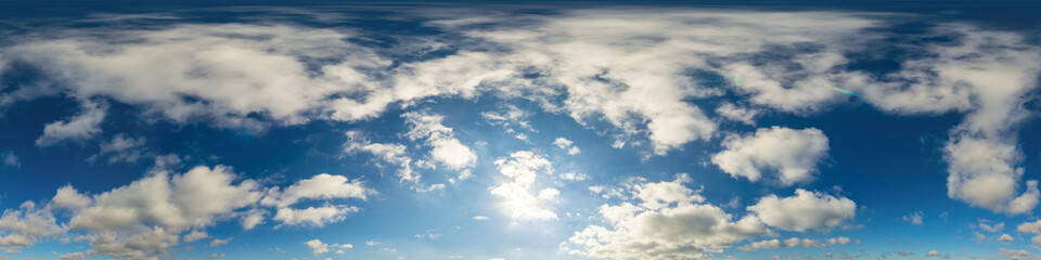 Blue sky panorama with puffy Cumulus clouds. Seamless hdr pano in spherical equirectangular format. Sky dome or zenith for 3D visualization, game and sky replacement for aerial drone 360 panoramas.