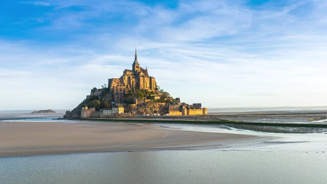 Aerial view Hyperlapse .This video is taken in the Mont Saint-Michel, France with drone during the sunset. You can see the monument with a great light and great landscapes. Aerial view Hyper lapse
