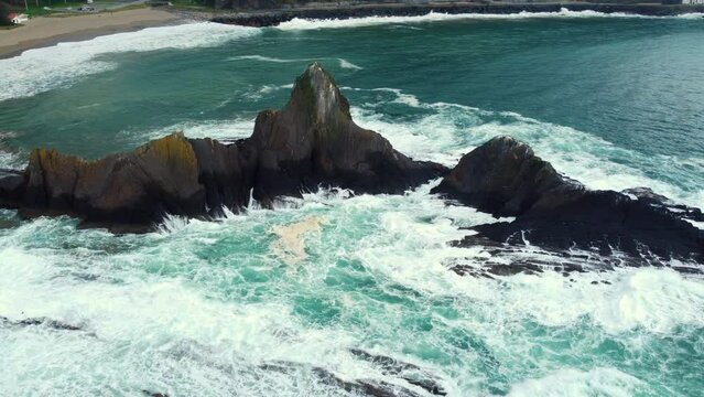 Aerial view of Rocky coastline and Flysch on the beach Saturraran, Ondarroa, Spain. High quality 4k footage.