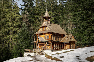 Zakopane style chapel called "Jaszczurówka". A small wooden chapel covered with shingles. Zakopane, Poland © p  a  t  r  i  c  k