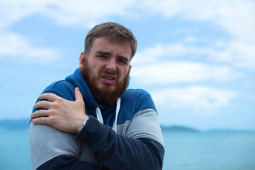 Portrait of unhappy depressed frozen trembling guy, young shivering from cold sad upset man on the...