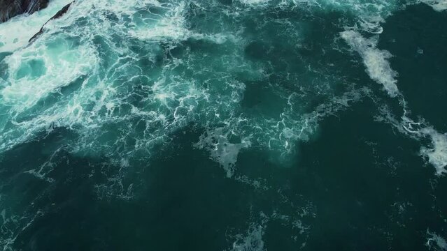 Aerial view of Rocky coastline and Flysch on the beach Saturraran, Ondarroa, Spain. High quality 4k footage.