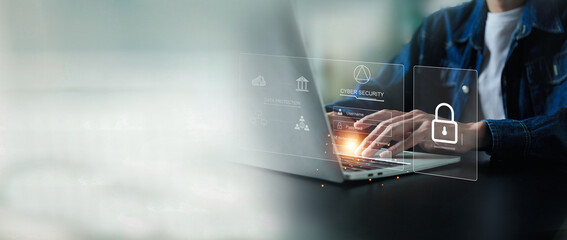 businesman is using laptop for cyber security protection , security login with key , user privacy...