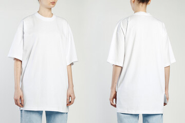 A woman wears a white over size t shirt