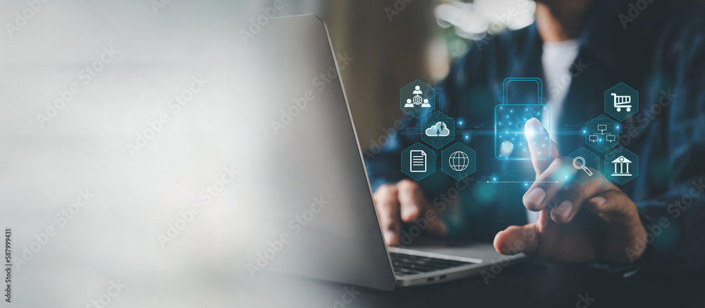 Aufkleber businesman is using laptop for cyber security protection , security login with key , user privacy se