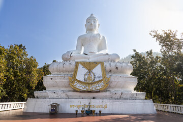 Fototapeta premium Wat Phra That Mae Yen, or Big White Buddha is huge white Buddha stands on a hill with 353 steps, in Pai, Thailand. Thai words translated as Lord Buddha in English language.