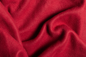 High resolution top view red fleece fabric with creases