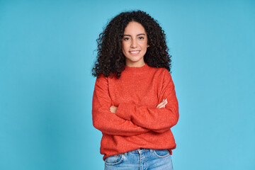 Young adult smiling latin professional woman, happy pretty curly hispanic female model student...