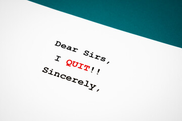 The Document from employee to employer with note text DEAR Sirs, I quit sincerely, concept of decision making to resign or to quit job.