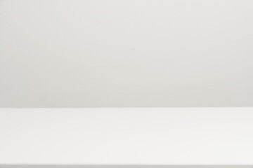 Empty white table top, mock up, white desk and white background. - Powered by Adobe