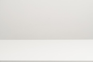 Empty white table top, mock up, white desk and white background.