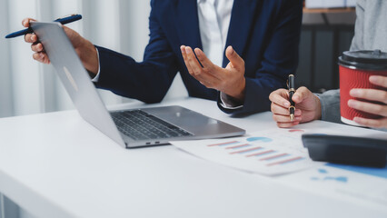 Young Asia female leader business woman coaching new smes bookkeeping audit accounting interview with trainer training business job.