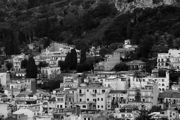 Black and white artistic dark panoramic view of Taormina, Sicily