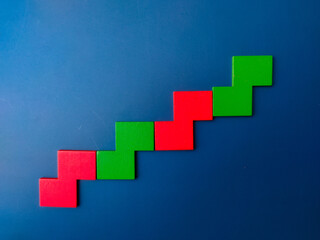 Colored wooden puzzle arranged on a blue background