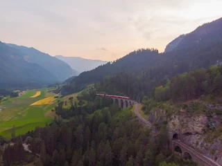 Wall murals Landwasser Viaduct Aerial view of the famous red train on the Landwasser Viaduct, Switzerland.