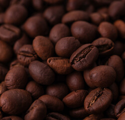 Naklejka premium Detailed coffee beans. Close up macro coffee beans.