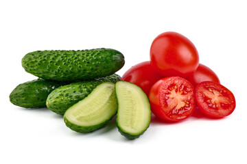 Cucumbers and tomatoes, close-up, isolated on white background.