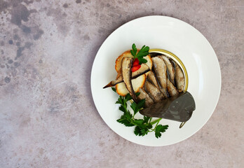 Canned fish, bread slices