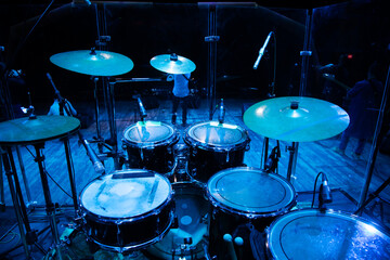 drum set on stage in a concert hall. Large-sized photo with soft change selectivity. Vintage live...