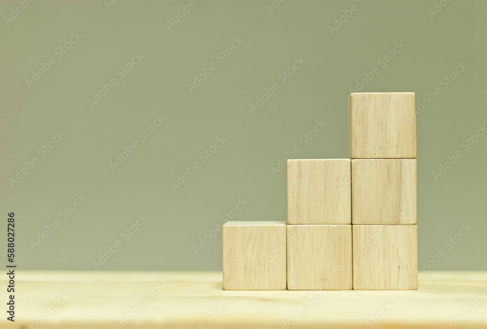 Poster blank wooden cubes arranged in stairs shape on table for input wording and infographic icon.