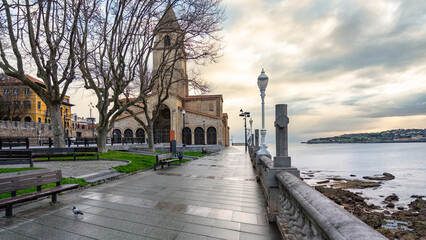 Promenade that runs next to the church of San Pedro in the coastal city of Gijon, Asturias.