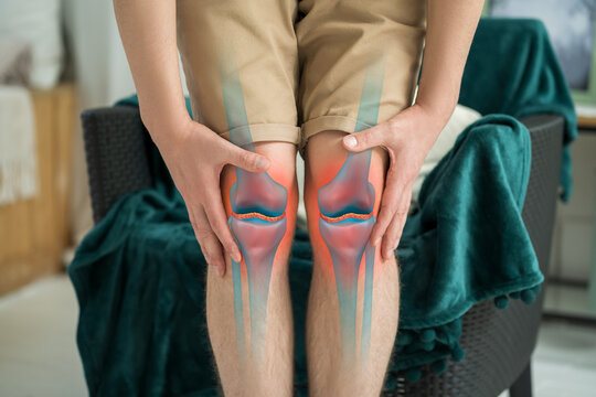 Knee pain, man suffering from osteoarthritis at home