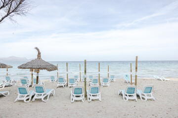 blue beach chairs and umbrellas, Can Picfor