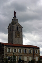 Fototapeta na wymiar Statue and tower - La madone - Chazay d'Azergues - Rhone - France