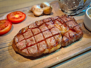 Close up Steak set serve with side dish in restuarant.