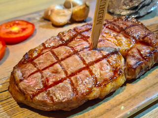 Close up Steak set serve with side dish in restuarant.