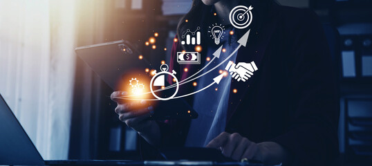 Startup concept with icon business and network connection on modern virtual interface from digital tablet. man touching on tablet. online business, e-comers, online marketing