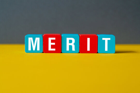 Merit - word concept on cubes, text