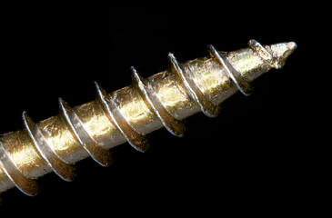 extreme closeup screw curved thread black background