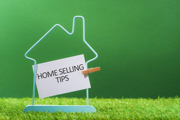 Real estate services consultation and advice. home selling tips text notice. house frame in green residential area. Finding new property or selling tips