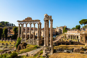 View of the ruins of the Roman Forum with the temple of Saturn and the temple of Vespasian and...