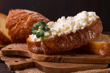 Sandwich, with cream cheese, homemade, on a cutting board, rustic style, no people, selective focus, breakfast