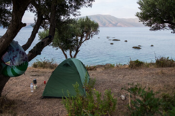 tent for camping on the beach on the background of the Seascape