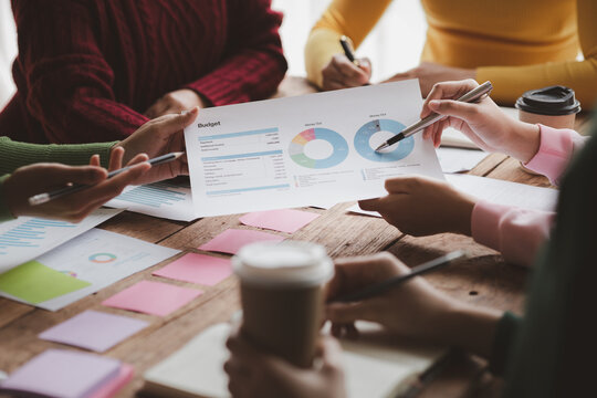 Group businessman attended a meeting with executives of startup companies, startup company sales team meetings, brainstorming and summary of company performance. Business strategy management concept.