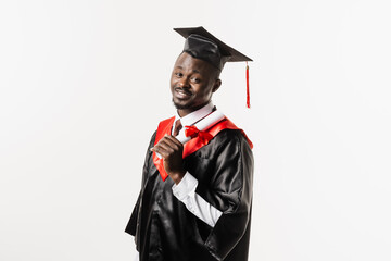 Confident african student with diploma in graduation robe and cap ready to finish college. Future...