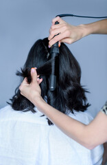 Fototapeta premium Beautiful dog golden retriever labrador sits in the grass in spring for a walk