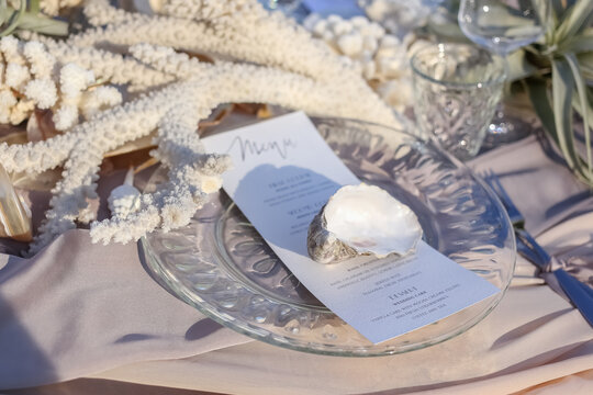 A wedding table setting bathed by the sun