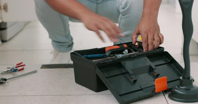 Repair, maintenance and man with box of tools for home construction, fixing and kitchen plumbing. Manual labor, DIY plumber and handyman pack equipment after working on sewer pipe, sink and faucet