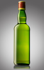 A bottle of whisky in green glass with a red cap on light gray background.