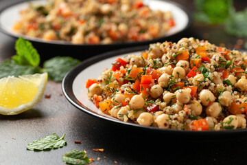 Chickpea Salad with Quinoa, sweet red pepper, herbs and lemon. Healthy food