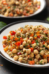 Chickpea Salad with Quinoa, sweet red pepper, herbs and lemon. Healthy food