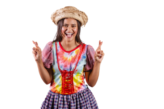 Brazilian woman wearing country clothes, São João party, Junina party. fingers crossed, lucky, wishing, wanting so much. Luck.