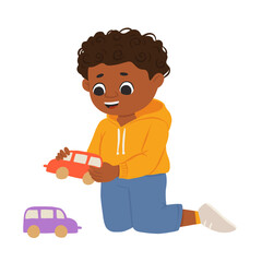 Cartoon happy boy of color playing with toy cars and smiling. Cute vector illustration isolated on white background.