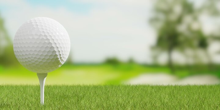 White golf ball on white golf tee close up with golf course fairway background with copy space, golf sports or activity concept